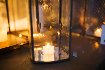 Image showing close up of lantern with candle burning inside