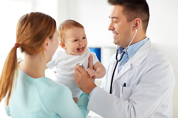 Image showing doctor with stethoscope and baby at clinic