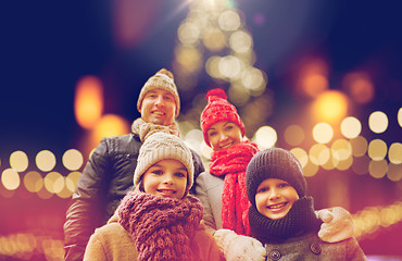 Image showing happy family outdoors at christmas eve