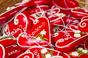 Image showing Licitars hearts, red colors cake of sweet honey dough that are p