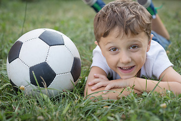 Image showing Portrait of a young  boy with soccer ball.