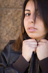 Image showing Beautiful Meloncholy Mixed Race Young Woman Portrait Outside.