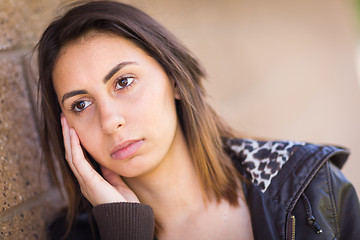 Image showing Beautiful Meloncholy Mixed Race Young Woman Portrait Outside.