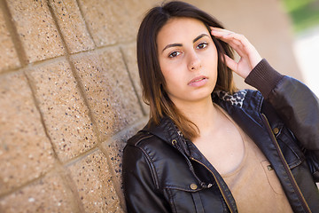 Image showing Beautiful Meloncholy Mixed Race Young Woman Portrait Outside.