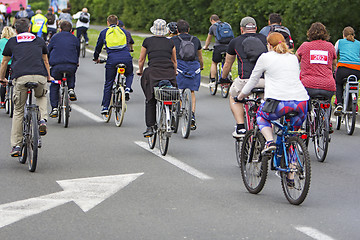 Image showing Bicyclists in traffic public transport in the city