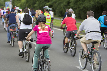 Image showing Bicyclists in traffic public transport in the city