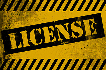 Image showing License sign yellow with stripes