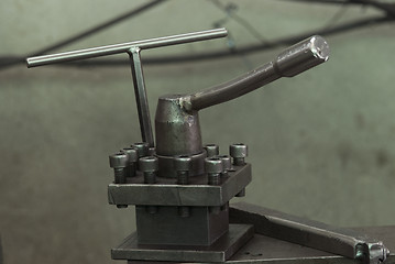 Image showing Controls of a steel lathe