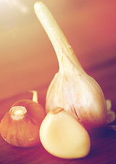 Image showing close up of garlic on wooden table