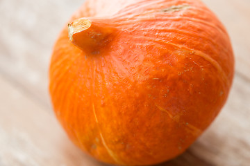 Image showing close up of pumpkin on wooden table