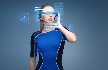 Image showing woman in virtual reality 3d glasses with charts