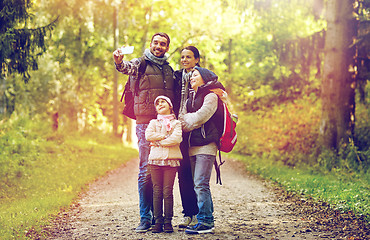 Image showing family taking selfie with smartphone in woods