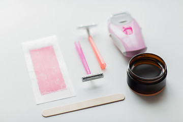 Image showing safety razor, epilator, hair removal wax and patch