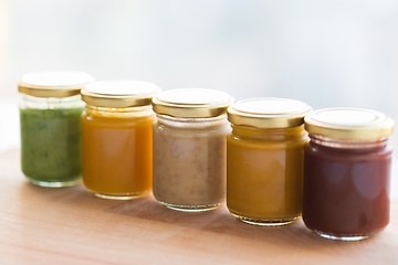 Image showing vegetable or fruit puree or baby food in jars