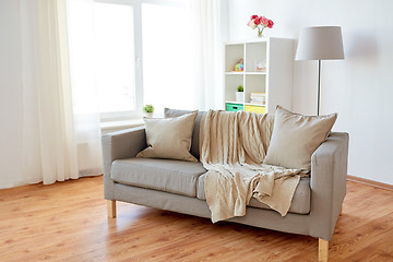 Image showing sofa with cushions at cozy home living room