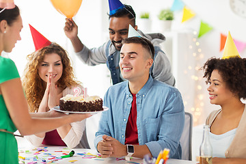 Image showing team greeting colleague at office birthday party