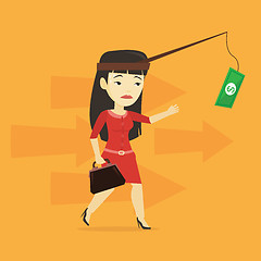 Image showing Businesswoman trying to catch money on fishing rod