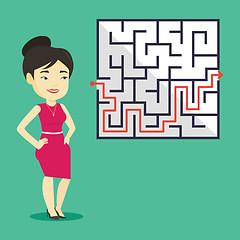 Image showing Business woman looking at labyrinth with solution.