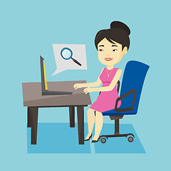 Image showing Business woman searching information on internet.