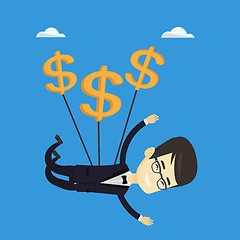 Image showing Business man flying with dollar signs.