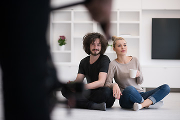 Image showing young couple in their new home