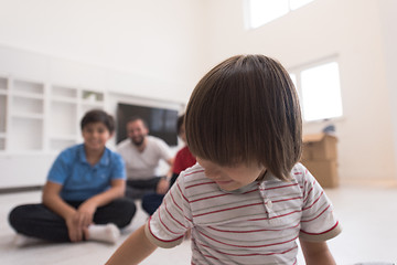 Image showing portrait of happy young boys with their dad