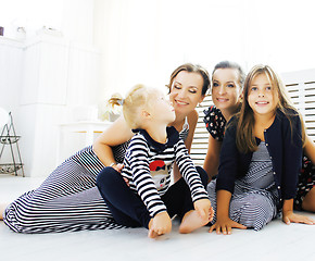 Image showing Mature sisters twins at home with little daughter, happy family 