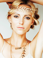 Image showing young blond woman dressed like ancient greek godess, gold jewelr