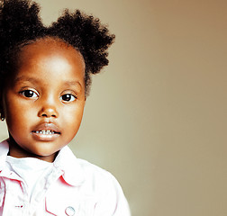 Image showing little cute sweet african-american girl playing happy with toys 