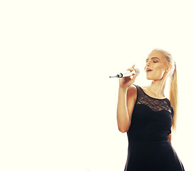 Image showing young pretty blond woman singing in microphone isolated close up