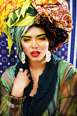 Image showing beauty bright woman with creative make up, many shawls on head l