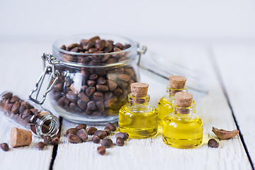 Image showing The cedar oil in a glass bottle