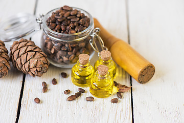 Image showing The cedar oil in a glass bottle