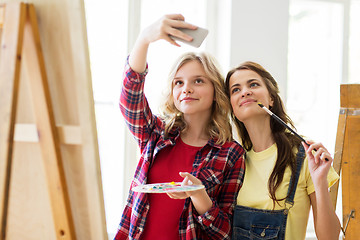 Image showing artist girls taking selfie at art studio or school