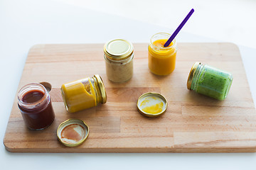 Image showing vegetable or fruit puree or baby food in jars