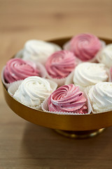 Image showing close up of zephyr or marshmallow on cake stand