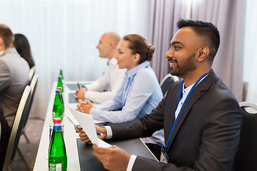 Image showing happy business team at international conference