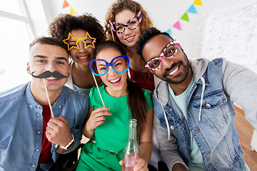 Image showing happy friends having fun at home party