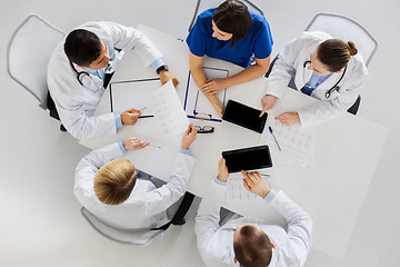 Image showing doctors with cardiograms and tablet pc at hospital