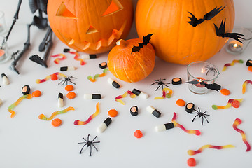 Image showing carved halloween pumpkins and candies