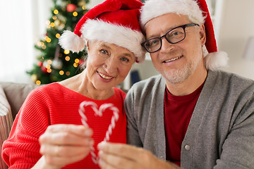 Image showing close up of happy senior couple at christmas