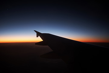 Image showing sunset from the airplane