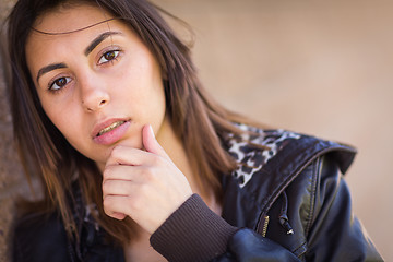 Image showing Beautiful Meloncholy Mixed Race Young Woman Portrait Outside.