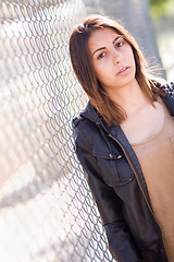 Image showing Beautiful Meloncholy Mixed Race Young Woman Portrait Outside.