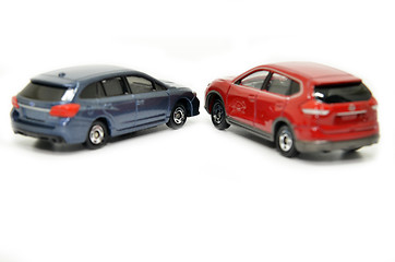 Image showing Small blue and red toy cars