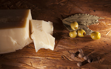 Image showing parmesan cheese and green olives