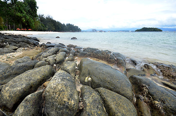 Image showing Cloudy and rocky beach in Manukan island