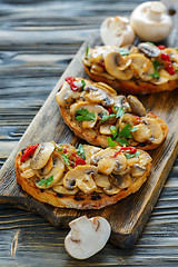 Image showing Ciabatta grilled with fried mushrooms and onions.