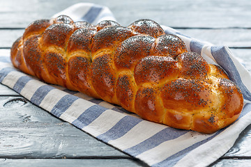 Image showing Homemade bread challah with poppy seeds.
