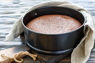 Image showing Chocolate cake in a metal form.